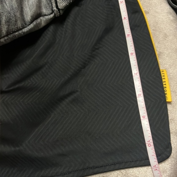 Nike dry fit shorts in black and gold. Live strong logo. - Picture 7 of 10